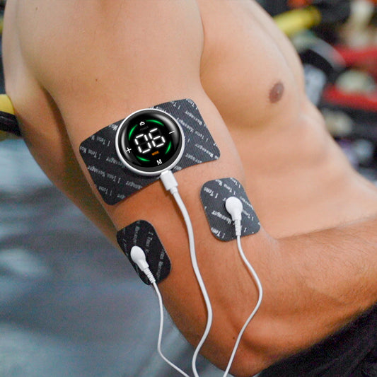 portable TENS machine on a bicep