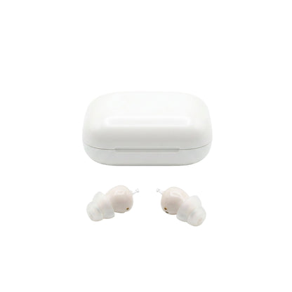 Beige wireless hearing amplifiers with a white charging case on a white background
